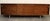 This Danish rosewood side board was designed by Bodil Kjaer in 1959. This piece was made by E. Pedersen & Søn in Denmark....