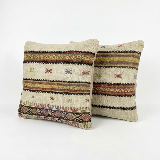This beautiful 20'' X 20'' pillow cover set was made from authentic Turkish Kilim pieces. Bright colors of wool adorn the...
