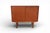 Danish neat cabinet in teak with sliding doors. The cabinet is in a very unusual neat size that is nevertheless just as...