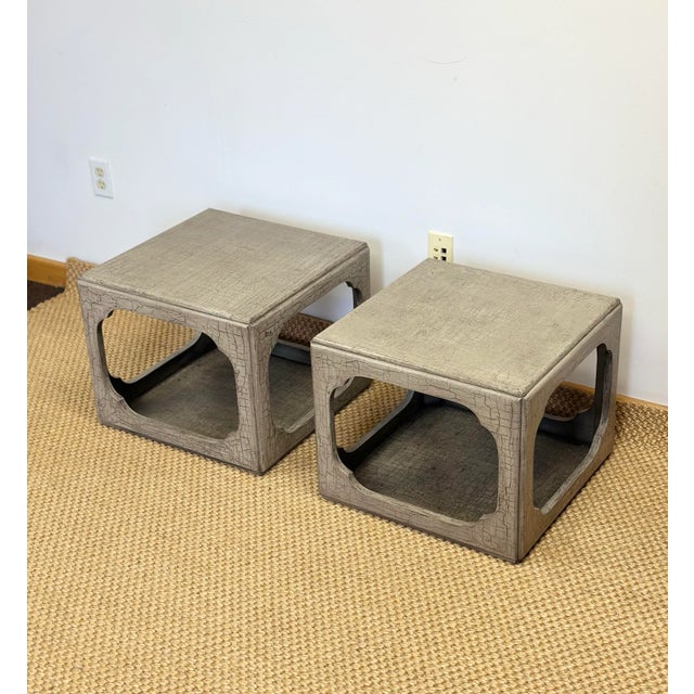 We are very pleased to offer a pair of end tables attributed to Michael Taylor's Far East Collection for Baker Furniture,...