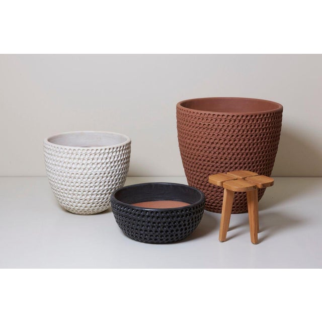 This set consists of a large brown, a medium white, and a small black thumbpot by Fresno, California based Artist Stan...