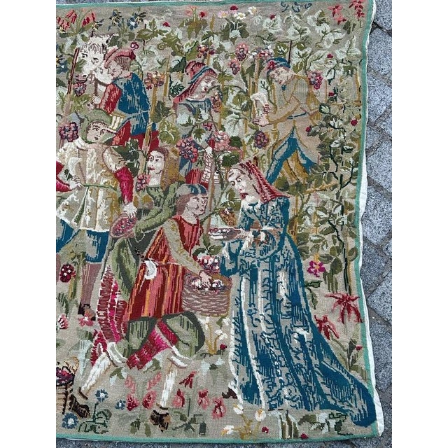 Discover the elegance of this mid-century french needlepoint tapestry featuring an alteration from the exquisite design of...