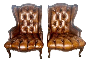 Pair of French Leather Tufted Wingback Chairs C. 1930