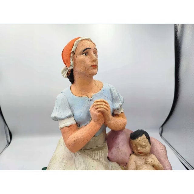 Pre-war figure, terracotta, Jesus in a manger, dimensions: height 38 cm, width 28.5 cm, depth 22 cm.