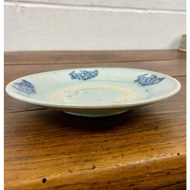 This is a gorgeous antique Chinese blue and white patterned plate, believed to be from the Qing dynasty. Dimensions: -6.65...