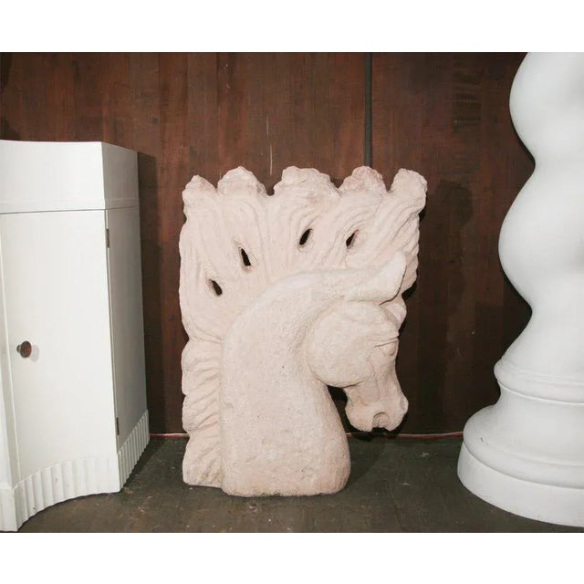 Large pair of stylized plaster horse heads. Perfect for a library room.