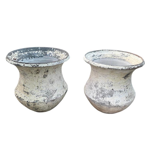 This striking pair of vintage resin garden planters beautifully emulates the heavy, weathered texture of ancient hand-...