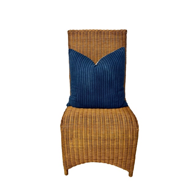 Set of four substantial sculptural Hollywood Regency Trompe L'Oeil draped wicker woven rattan ghost chairs with arms. This...