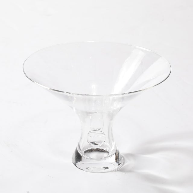 A stunning Mid-Century Modernist footed crystal bowl, featuring elegant organic detailing, signed Steuben, American, circa...