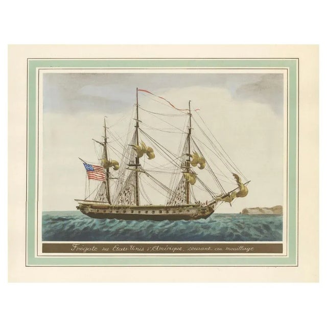 This print depicts an American frigate from the caption "Frégate des États-Unis d'Amérique, courant au mouillage," which...