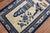 An early 20th century Chinese Peking carpet in tan and blue colors featuring a whimsical motif. Even Full Pile Condition...