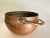 Vintage hammered copper bowl with handle. 7” x 7” x 4” (with handle up 8 1/2” tall). Weighs 1 pound, 8.5 ounces.