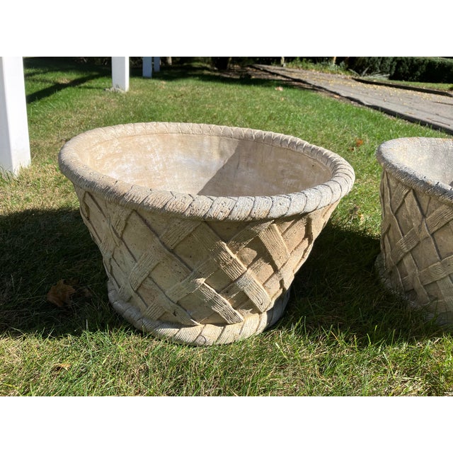Delightful pair of planters in cast cement with a basket weave design Large size 19 x 19 x 12 H There is a drain hole in...
