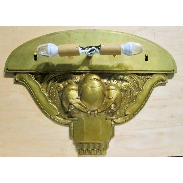 Beautiful Art Deco Bronze sconce with a clip-on silk shade. Five birds nest in the middle of fabulous scrolling deco ferns...