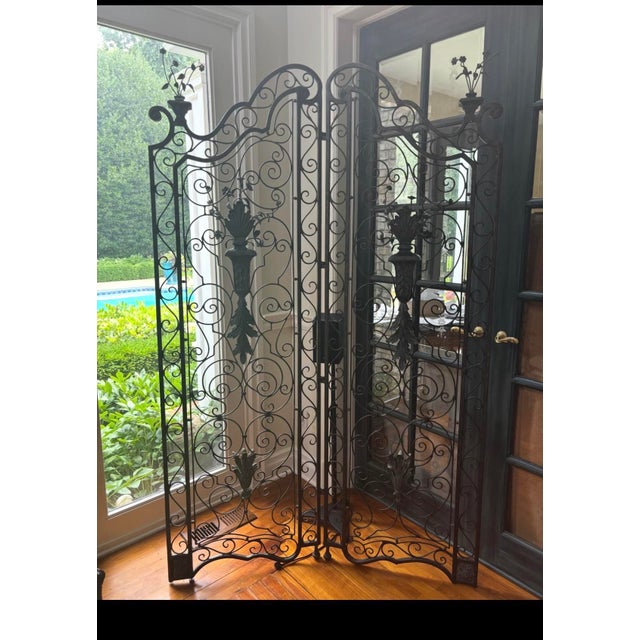 These are a striking set of 2 vintage Maitland-Smith wrought iron room screens. They feature exquisitely hand-forged...