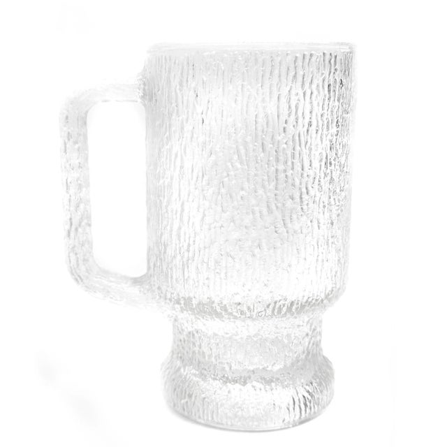 Sip in style with this set of 6 vintage mid-century modern glass mugs with a striking and classic bark textured surface....