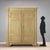Baroque wardrobe in green lacquered poplar. Front with a pair of tripartite paneled doors and carved uprights, bracket...