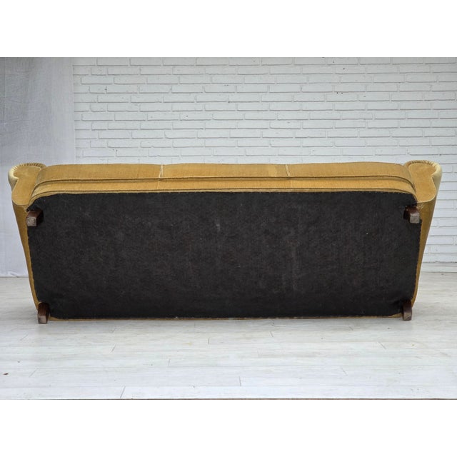 1960s, Danish 3-seater sofa. Original light green furniture velour, brass springs in the seat, oak wood legs. Original...