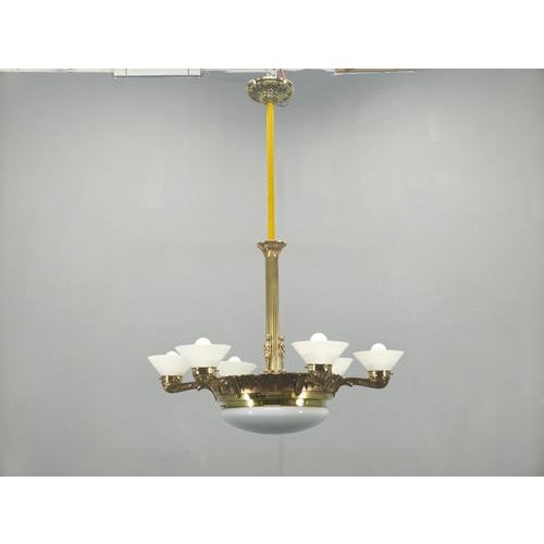 A rare and elegant Art Deco chandelier from 1930s Czechoslovakia, showcasing exceptional craftsmanship and timeless...
