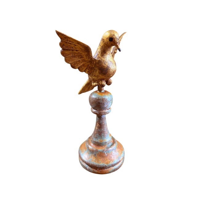 Add a playful touch to your space with this unique European hand-carved wood bird sculpture. Standing majestically on a...