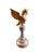 Add a playful touch to your space with this unique European hand-carved wood bird sculpture. Standing majestically on a...