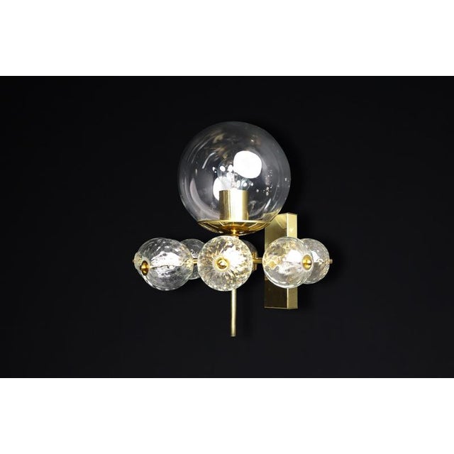 Mid-century wall lights with brass fixture and hand-blown glass globes by preciosa, czechia, 1960 this stunning mid-...