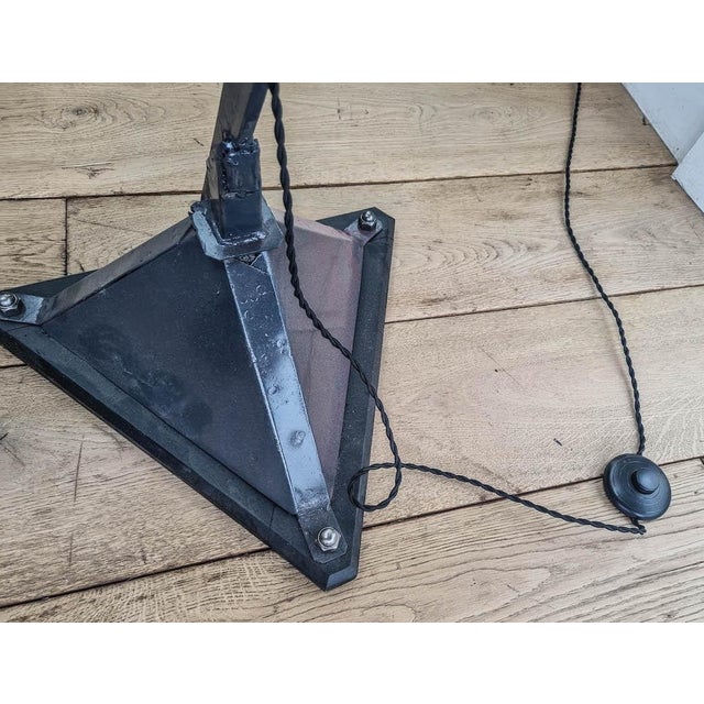 Large articulated lamp created from a 1930s drafting table pantograph, adjustable by adding two vintage industrial...