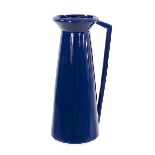 This ceramic pitcher features a graceful lip and is versatile for various occasions. Each pitcher is adorned with a...