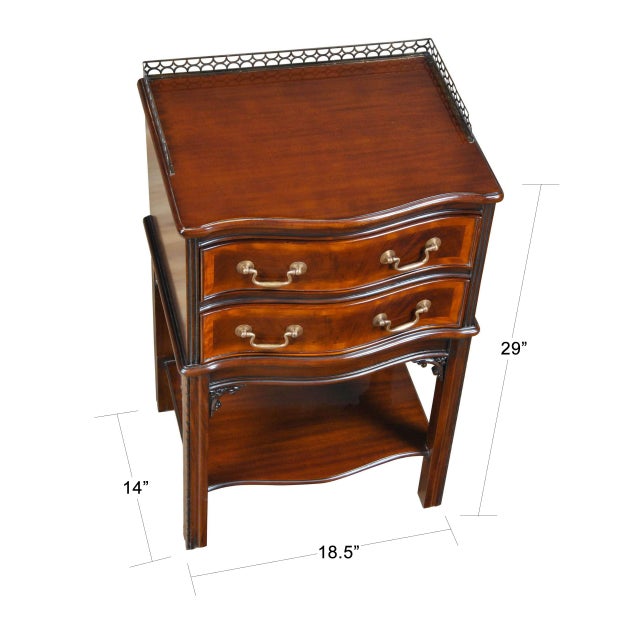 An attractive two drawer serpentine front Chippendale End Table suitable for use as either an end table or as a night...