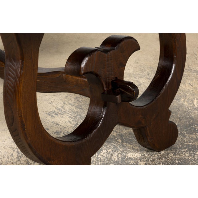 Sourced in Bordeaux, this late 19th-century Spanish oak refectory table commands attention through its impressive scale...