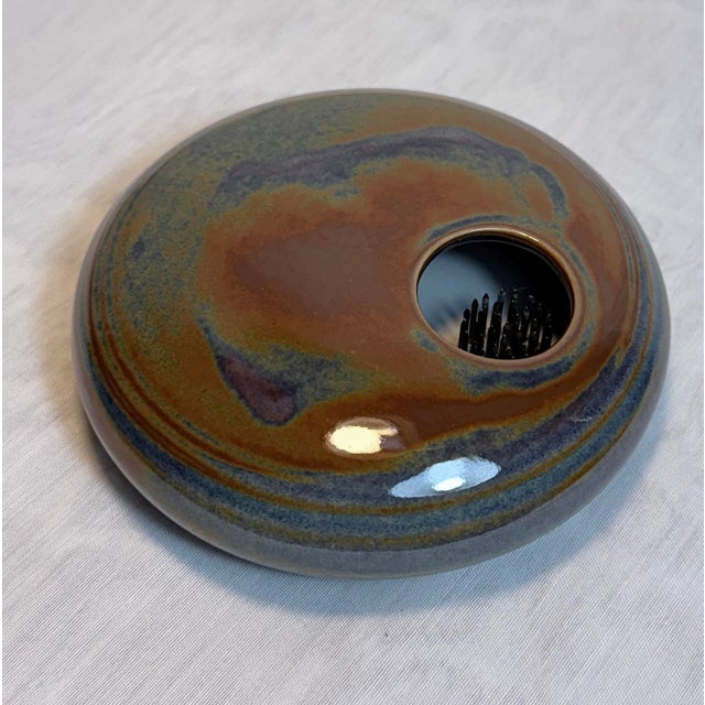 A signed studio pottery Ikebana flower frog by American ceramic artist Trent Gibbs, dated 2009. This low-profile ceramic...