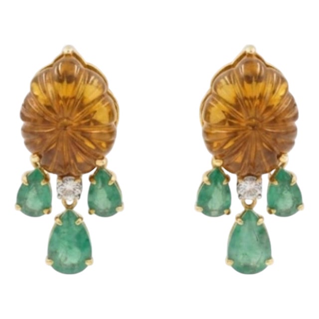 Gemstone details Emerald: 23.41 cts Diamond: 0.41 cts 18K gold Gross weight: 10.94 grams Net weight: 6.18 grams CODE: K