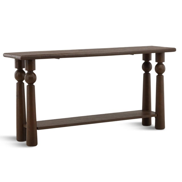 Modern espresso finish solid mango wood console table. Cylindrical legs with carved orb design adding playful character....