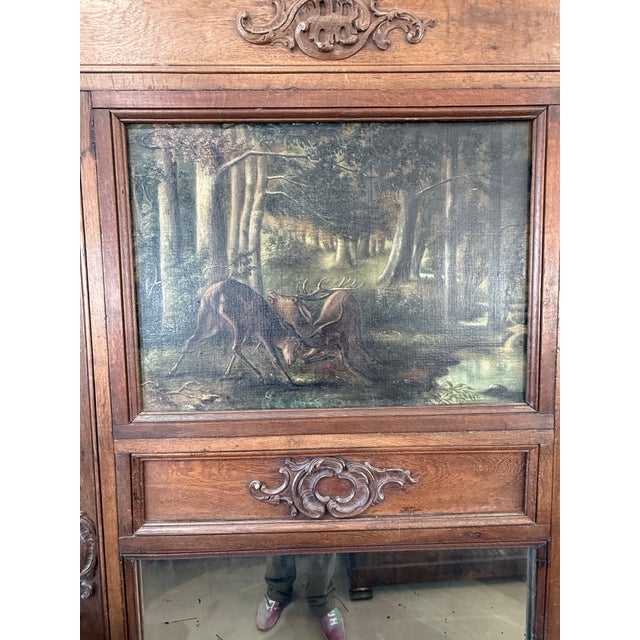 large 18th century French louis xvi carved trumeau mirror solid Oak with a hand painting in the top Circa 1750. the mirror...