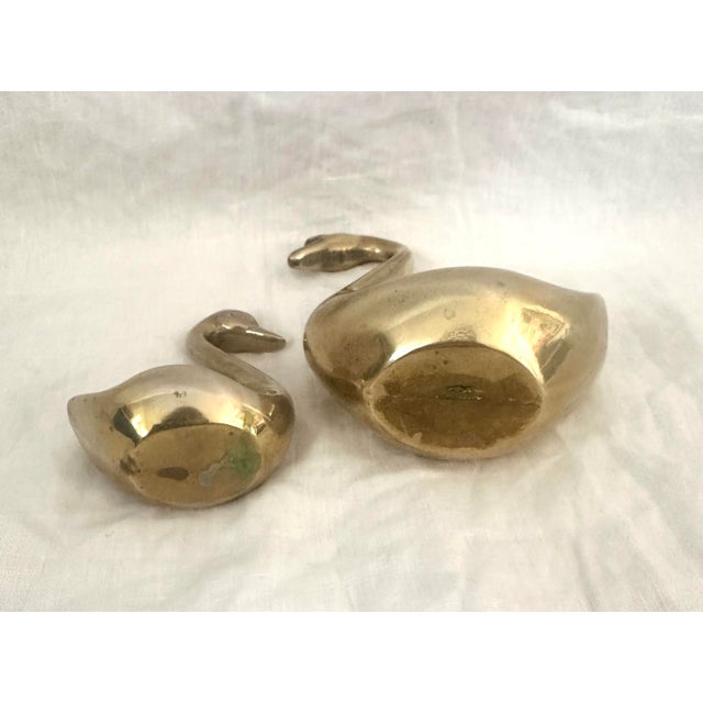 MCM brass pair of swans. Great for a centerpiece, paperweights or decor on a shelf. I have more in my other listings mix &...