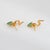 Finely detailed pair of vintage emerald snake earrings crafted in 18k yellow gold (circa 1990s). Pear cut emeralds measure...