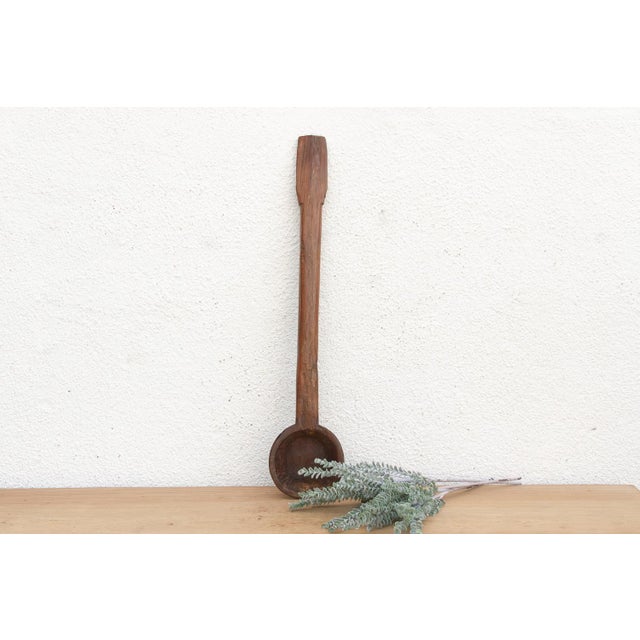 There is something deeply soulful about a simple wooden spoon—especially one carved by hand to feed a village. This...