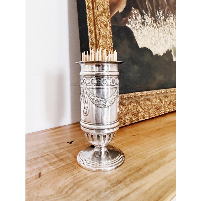 A lovely little antique circa 1910-20s silver plated toothpick holder, made for the famed Ritz Hotel in London. Marked on...