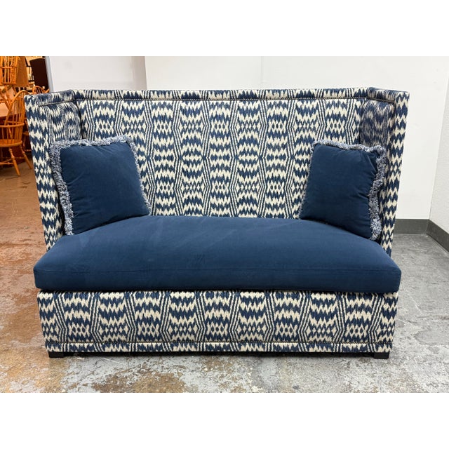 Design Plus Gallery presents the Marcourt Banquette by Bernhardt Interiors. This striking shelter-style settee features...