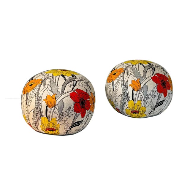 Pair of vintage Bernhardt Furniture poufs. Poufs are custom upholstered in high end vintage fabric. Circa 1980’s.