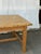 This is a mid 19th century English pine coffee table with a rustic, farmhouse style. It features a classic tapered legs,...