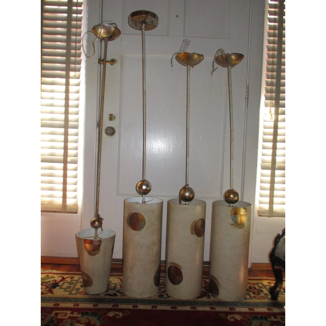 This is a Spectacular Set of Four New with Tags Flambeau Lighting Compass Pendant Lighting Fixtures by Designer Paul Gruer...