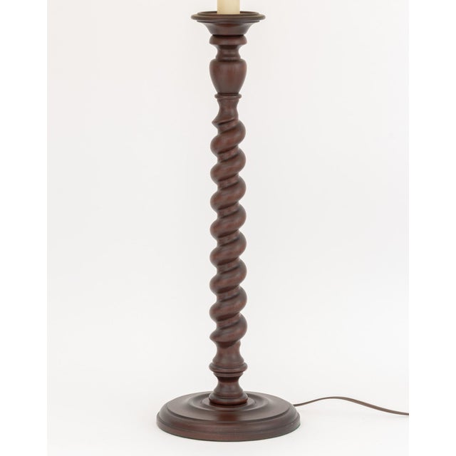Pair of Jacobean Style Carved Mahogany Barley Twist Table Lamps, with pleated coolie shades on circular bases. Overall:...