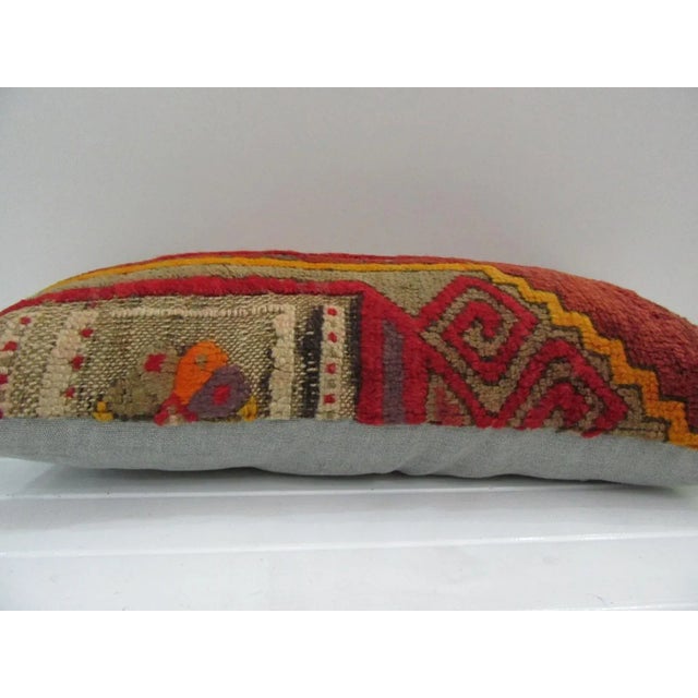 This is a pillow cover made from a vintage kilim rug. The piece was properly washed and ready to use. Pillow inserts not...
