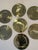 Set of 7 vintage brass charger plates. This set is in very good condition and will elevate any tablescape. Marked Made in...