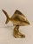 Brass Tropical Tang Fish Sculpture on a wave-cast stand. Features felt on the bottom of the base with a "Made In Korea"...