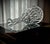 An Edwardian cut-glass sherry decanter, made in England around 1905. The piece features a rounded hand-blown body with...