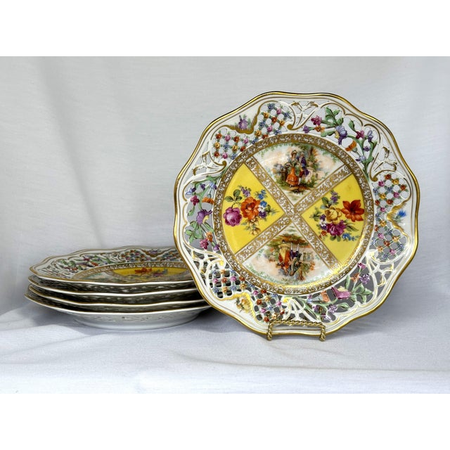 Colorful German porcelain yellow quatrefoil plate by Schumann Bavaria. Produced between 1945 and 1949 during the U.S....