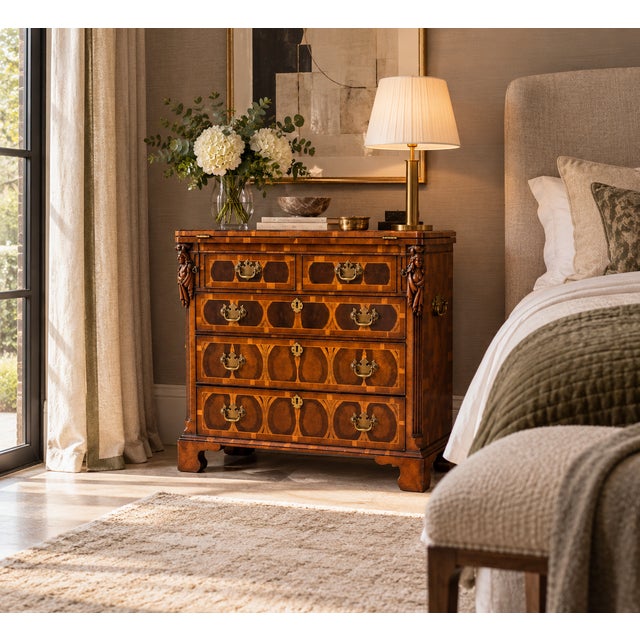 An exceptional antique george i yew wood and laburnum oyster veneered bachelor's chest dating to circa 1730, displaying...