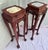 pair of solid rosewood display stands. Richly grained reddish-brown hardwood frame with a hand-polished finish. The tops...